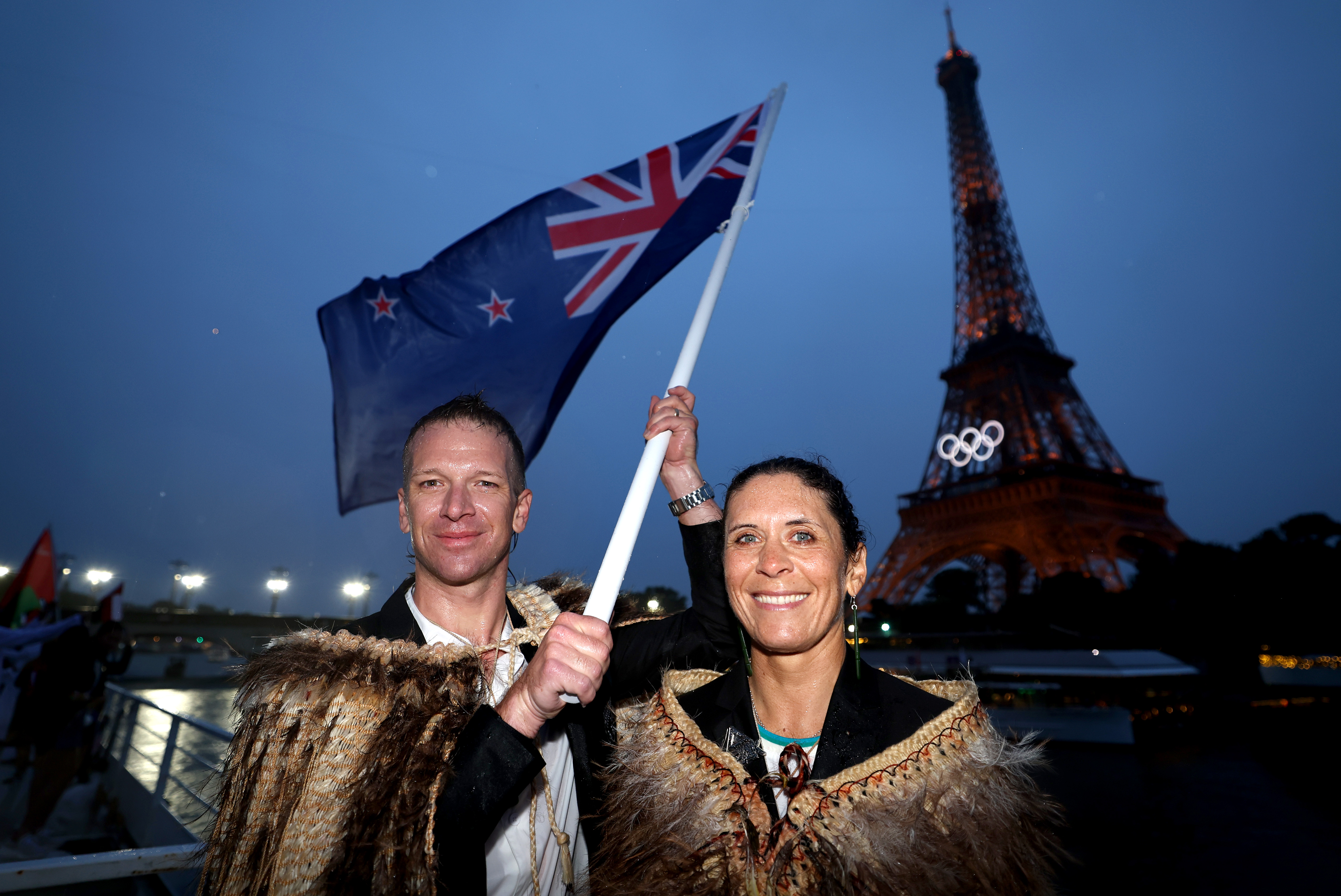 New Zealand flag bearers Aaron Gate and Jo Aleh at the opening ceremony. Photo / Getty Images