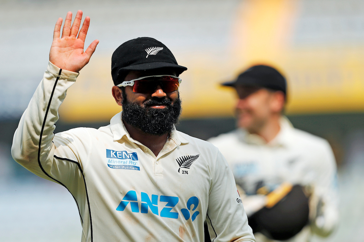 Ajaz Patel basks in the applause as he walks off the field following his 10 wickets. Photo / Photosport
