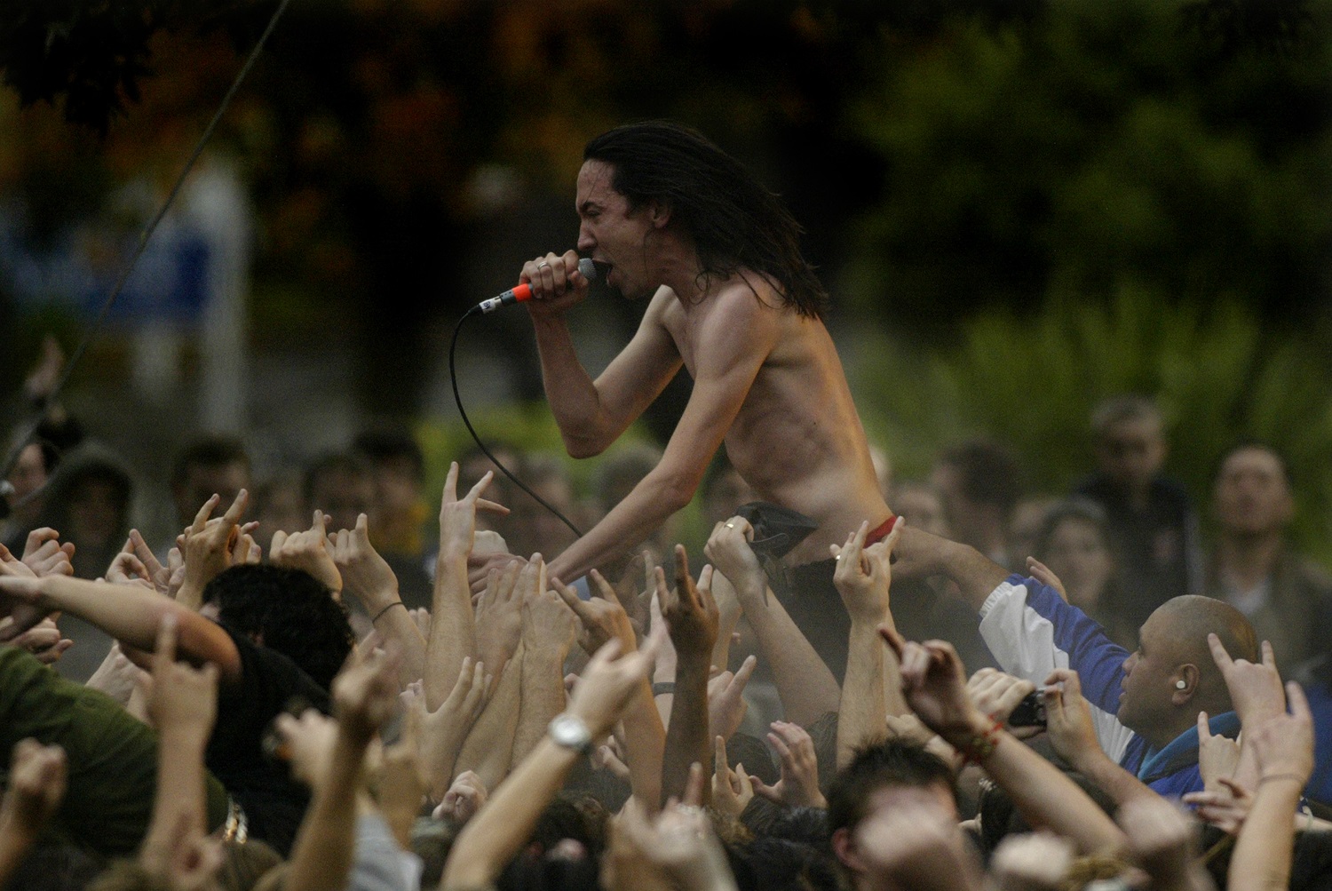 Shihad lead singer Jon Toogood and the crowd at the band's legendary free concert in Auckland's Aotea Square in 2005, which kicked off that year's New Zealand Music Month. Photo / Richard Robinson