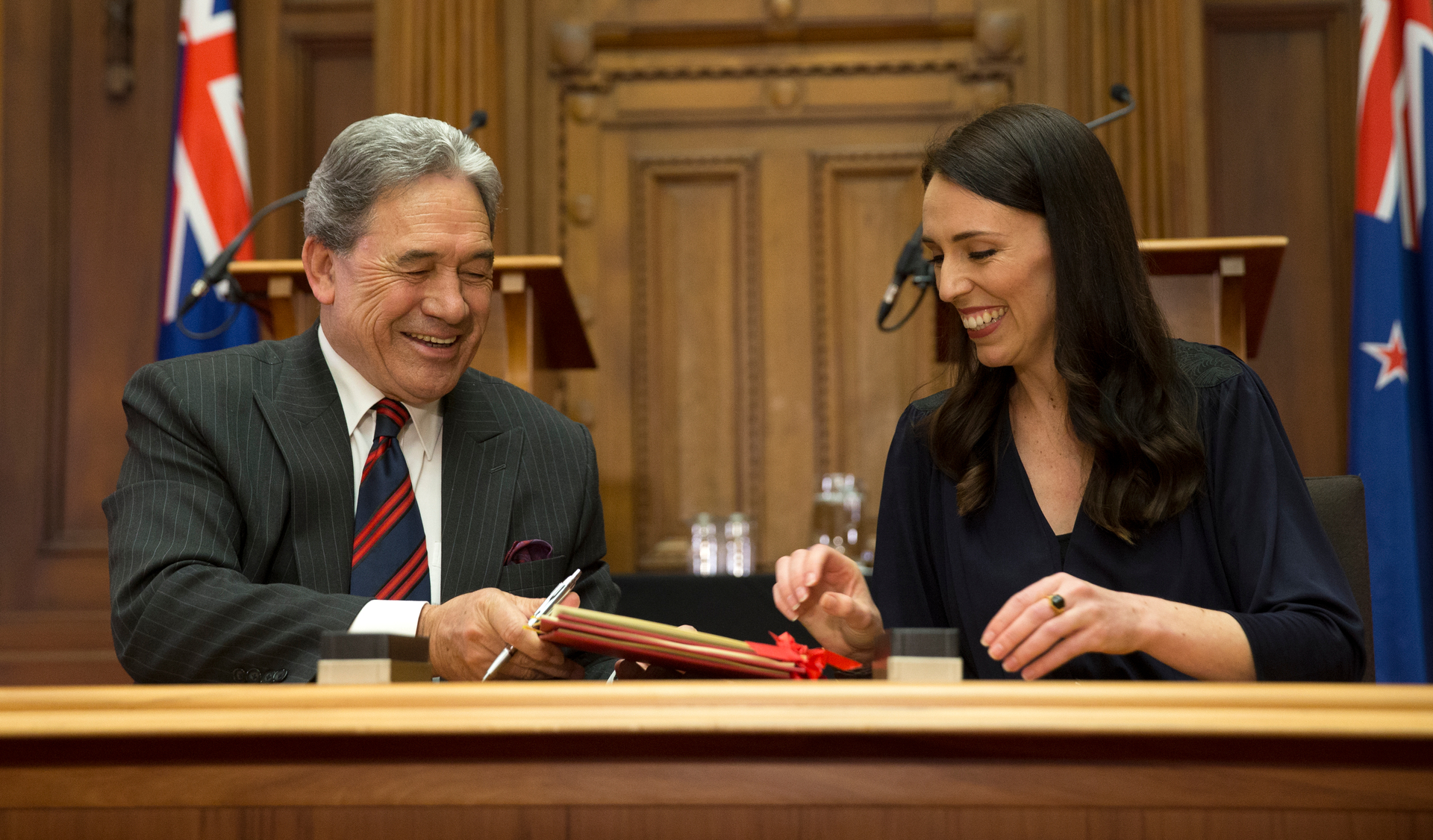 Winston Peters and Jacinda Ardern sign their coalition agreement in 2017. Photo / Mark Mitchell