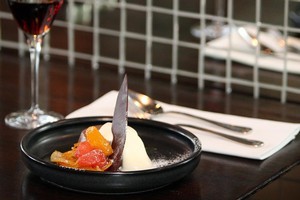 Rocco's dark chocolate and olive oil mousse with caramelised citrus and vanilla cream. Photo / Sarah Ivey