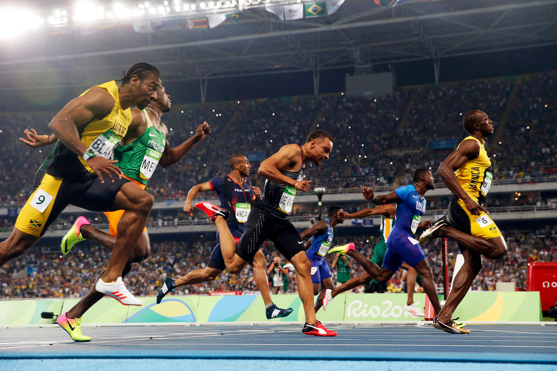 Usain Bolt of Jamaica (far right) wins gold in the men’s 100-metre final, for the third time, during the 2016 Summer Olympics in Rio de Janeiro. Photo / Doug Mills / The New York Times