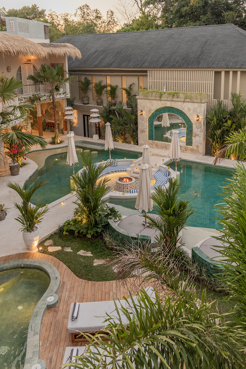 Escape Haven boasts a series of pools, fire pit, jacuzzi and swim-up juice bar.