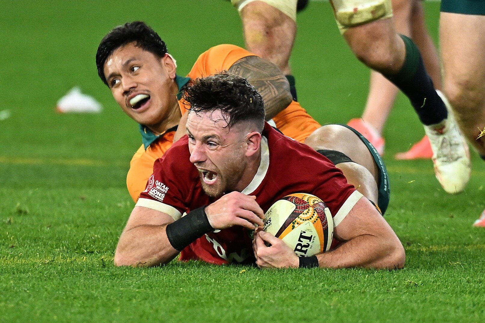 Hugo Keenan, of the Lions, scores the series-winning try in Melbourne. Photo / Photosport