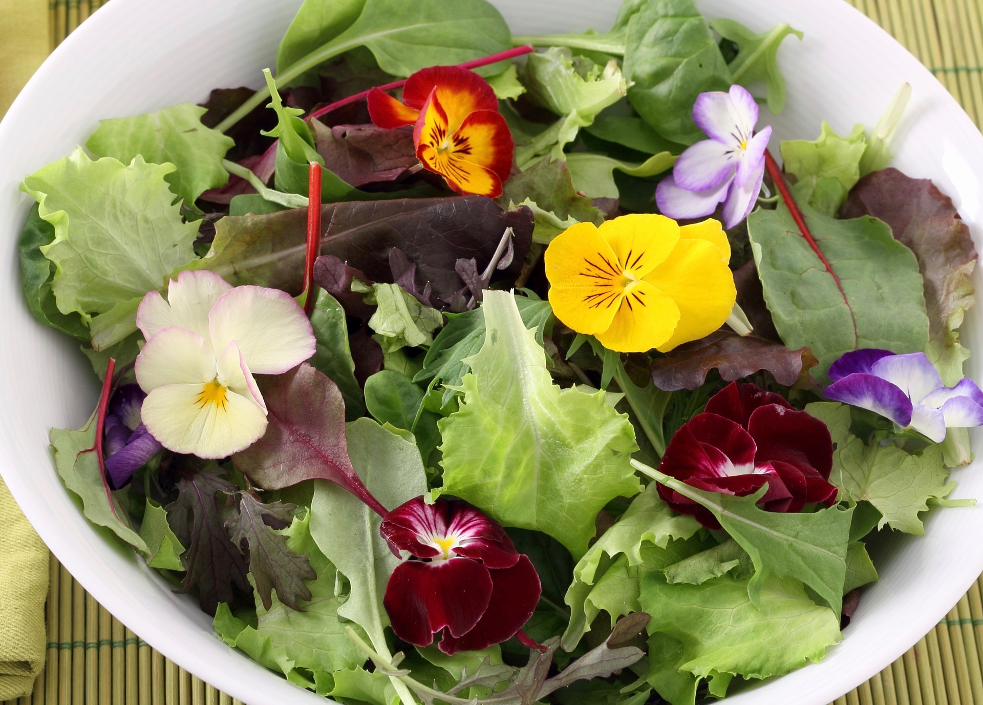 Edible flowers can really brighten up a bowl of salad greens.