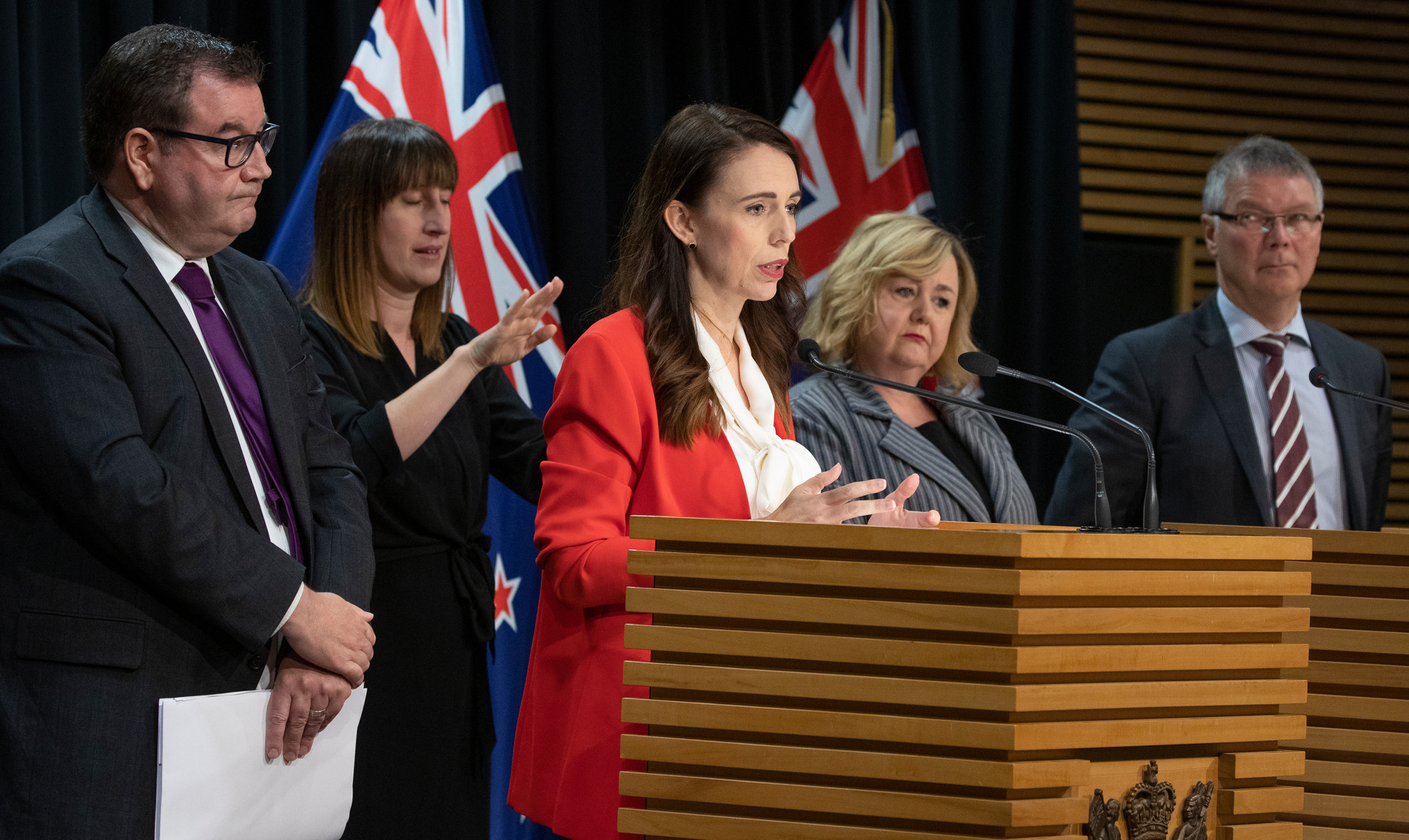 Prime Minister Jacinda Ardern, with, Finance Minister Grant Robertson, Housing Minister Megan Woods and Revenue Minister David Parker during the housing package announcement. Photo / Mark Mitchell