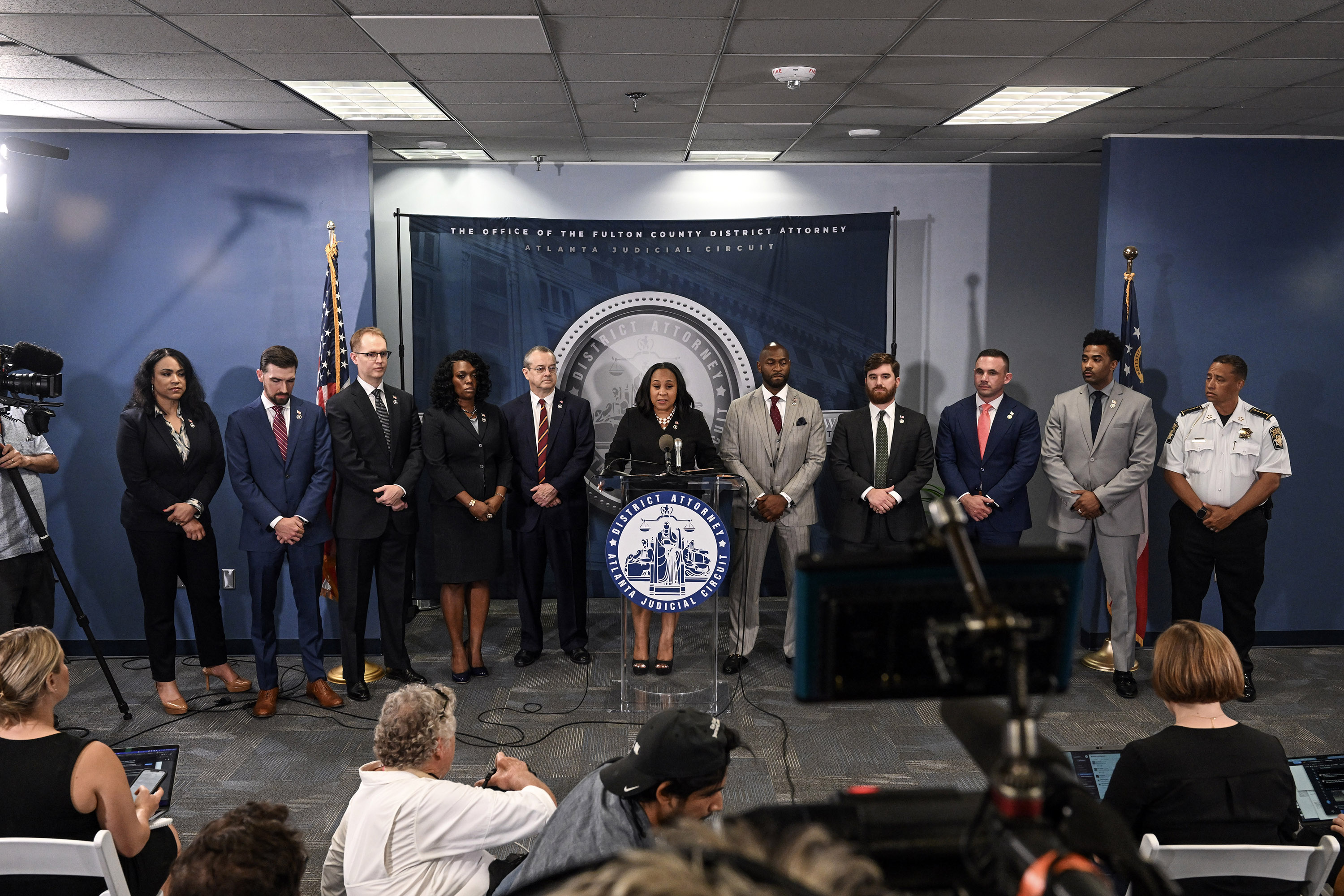 A controversy involving Fulton county district attorney Fani Willis, centre, has threatened to derail the case her office brought. Photo / Kenny Holston, The New York Times