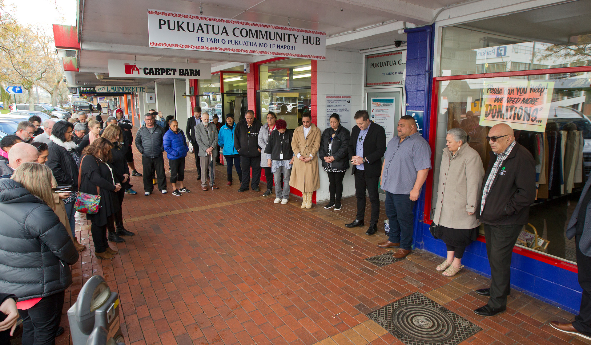 A group gathers at the official opening of the night shelter. Photo/Ben Fraser