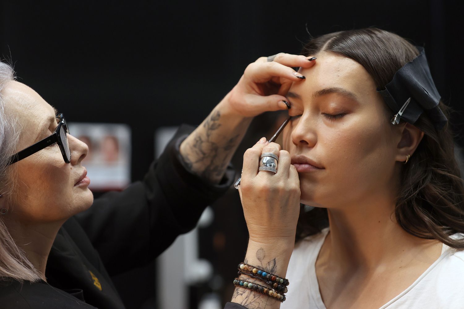 Basalaj Beauty makeup director Lisa Matson keys in the look on model Isabella Moore for Kiri Nathan’s show. Photo / Getty Images
