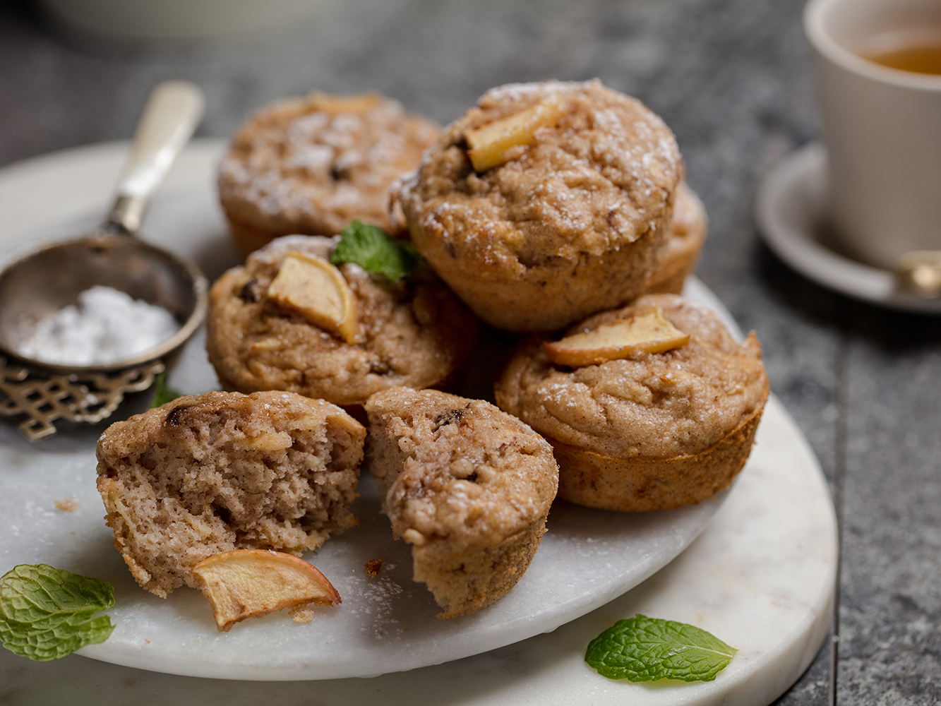 These apple and cinnamon muffins are the perfect bite, any time of day. Photo / Babiche Martens