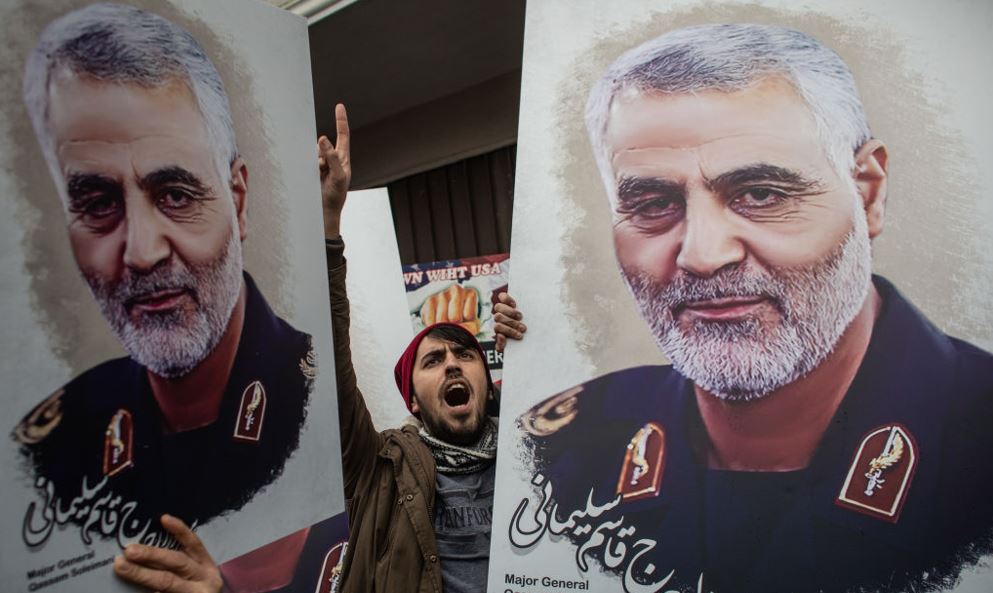 People hold posters showing the portrait of Iranian Revolutionary Guard Major General Qassem Soleimani, 2020. Photo / Getty Images