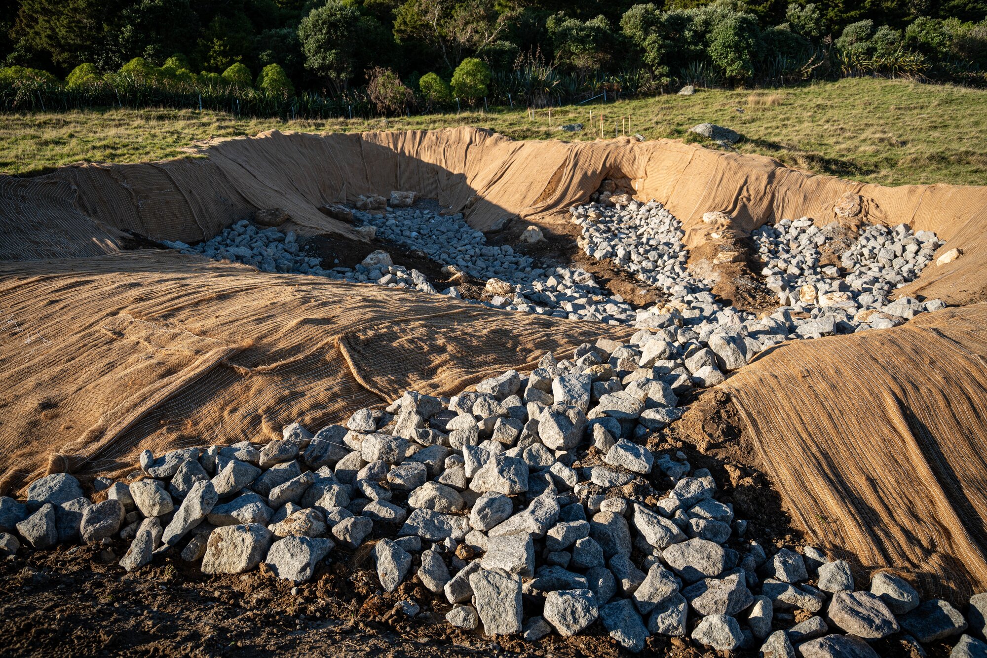 Remediation work on one of the Mauao summit track's landslides. Photo / Alyse Wright