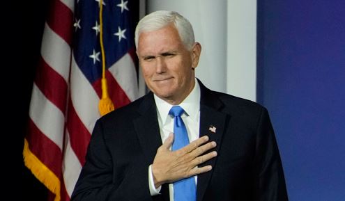 Former US vice-president Mike Pence reacts as he walks on stage to speak at an annual leadership meeting of the Republican Jewish Coalition. Photo / AP