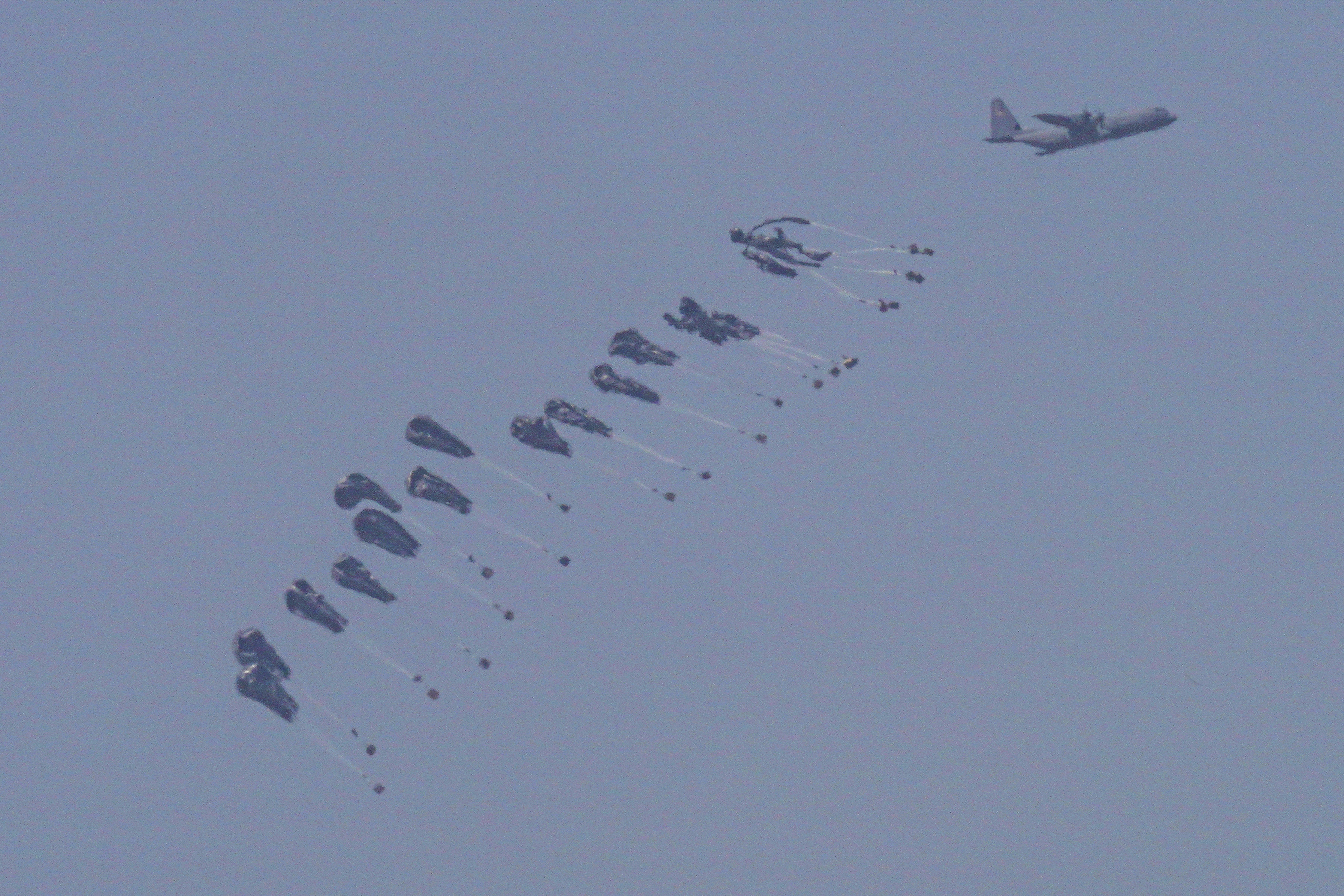 An aircraft drops humanitarian aid over the northern Gaza Strip. Photo / AP
