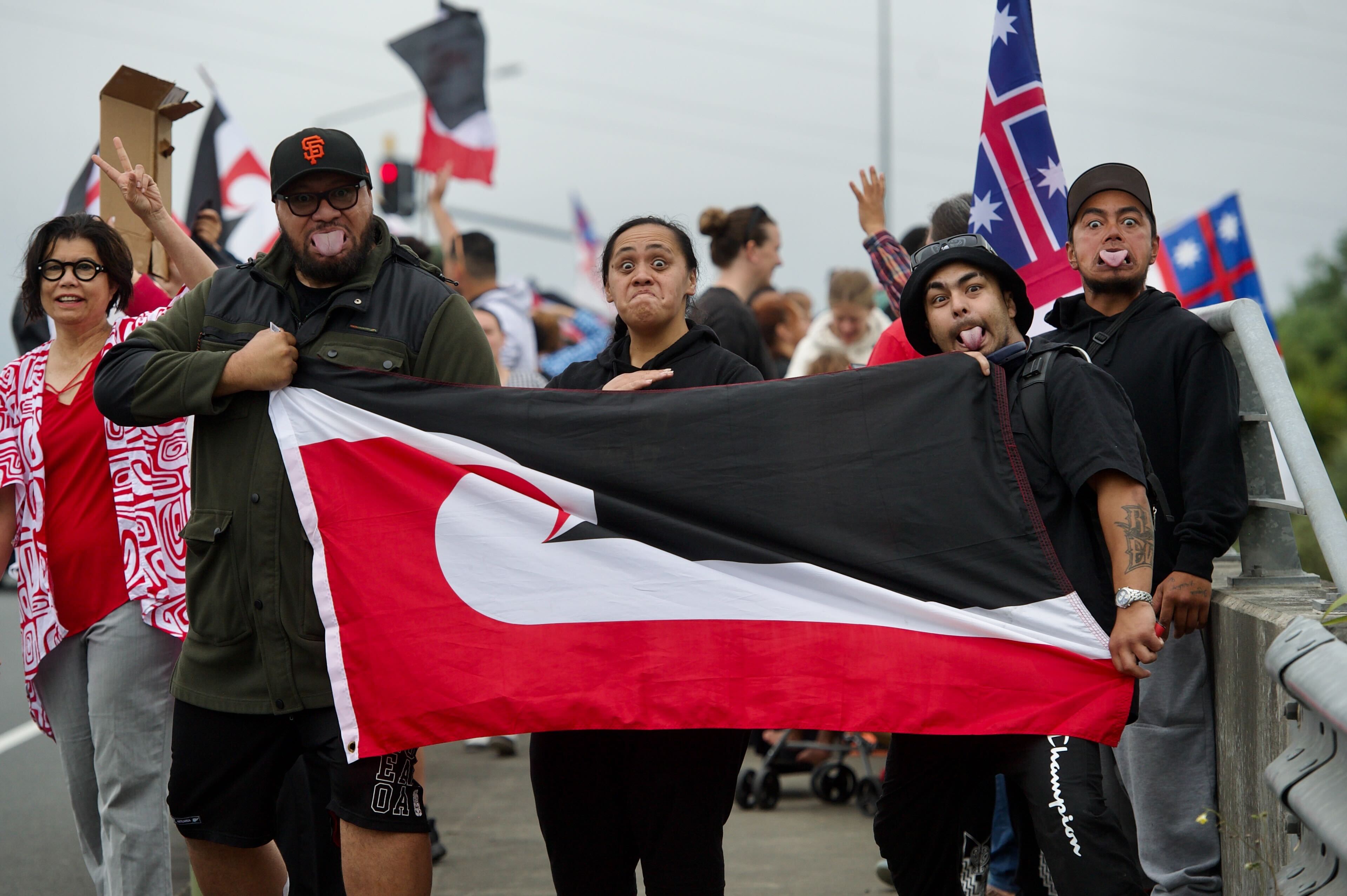 About 200 protesters remained on Mangere Bridge at 10am. Photo / Jason Dorday
