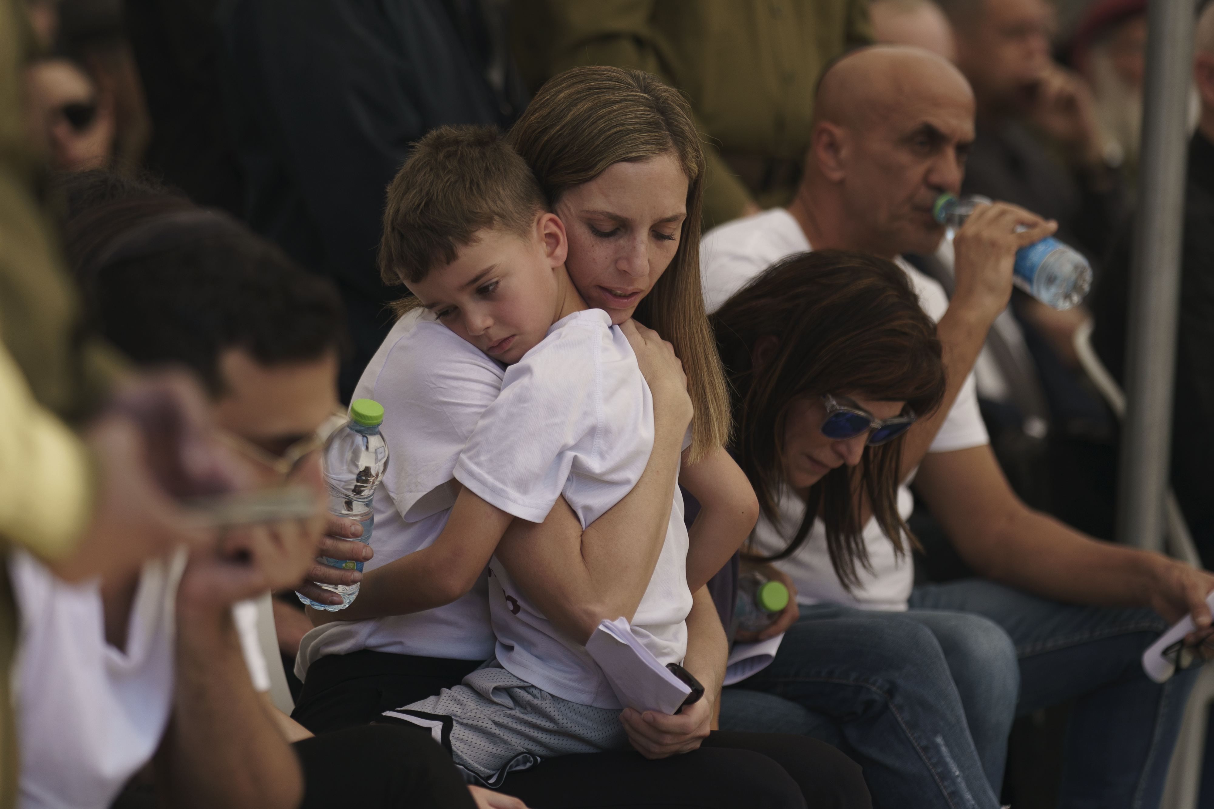 Relatives of Israeli Colonel Asaf Hamami mourn during his funeral at the Kiryat Shaul military cemetery in Tel Aviv. Photo / AP