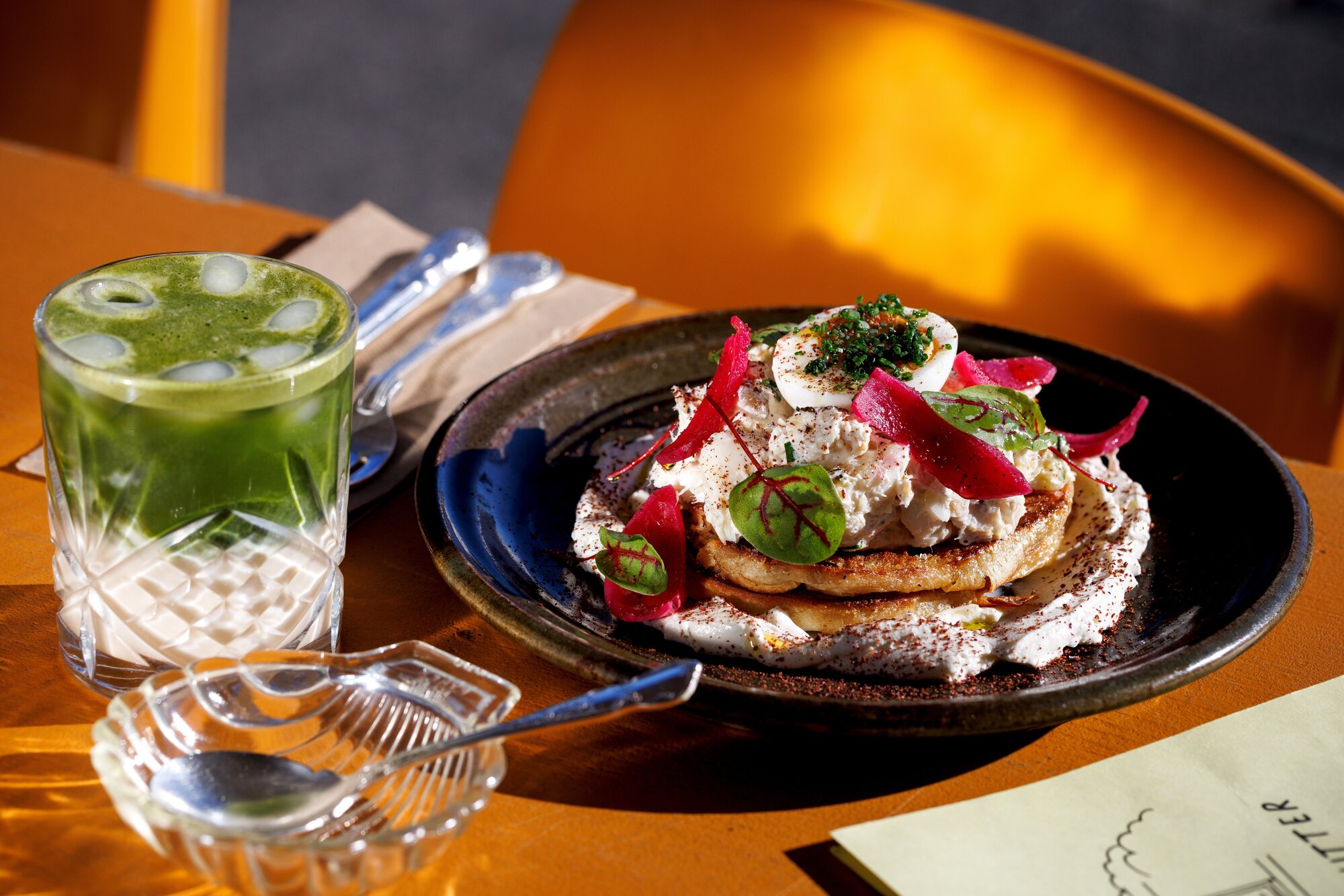 Burnt Butter Diner's smoked fish on a housemade crumpet has made the 2026 Iconic Auckland Eats Top 100 list. Photo / Babiche Martens