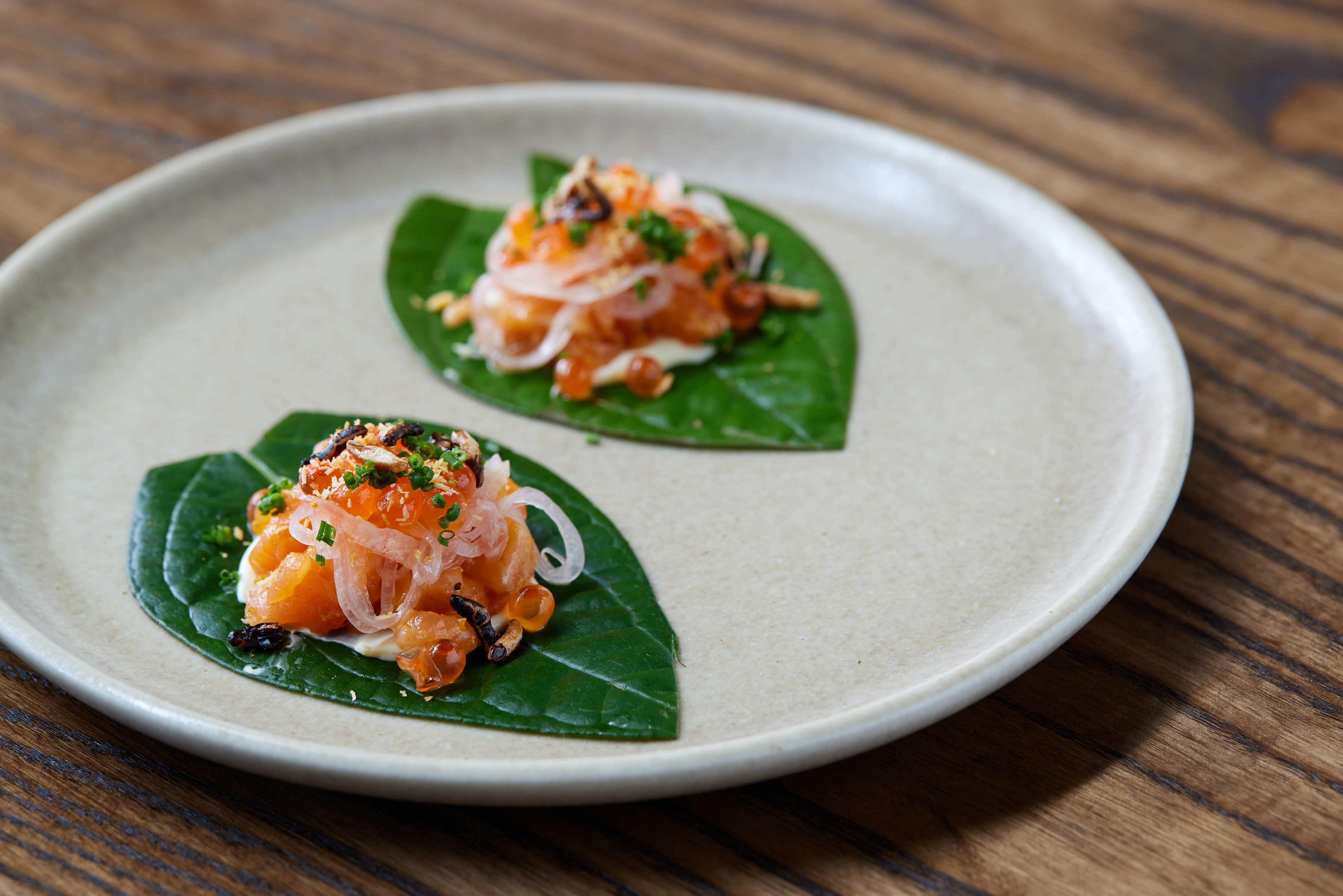 King salmon, betel leaf with pickled mango. Photo / Babiche Martens