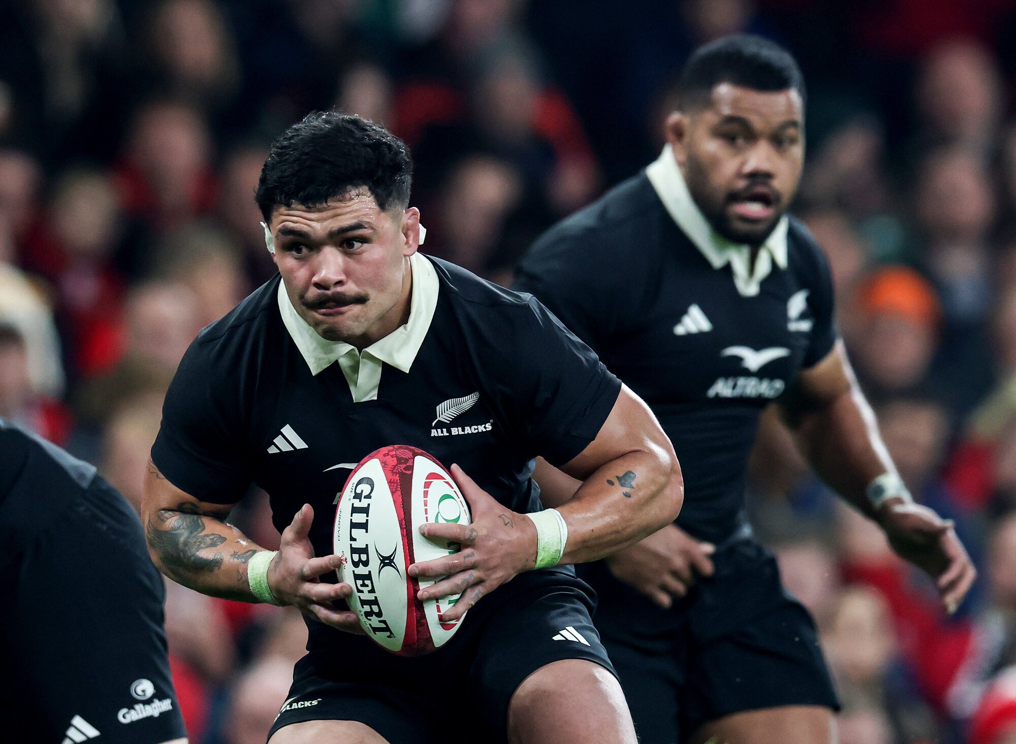 All Blacks openside flanker Du'Plessis Kirifi
on the charge against Wales, in Cardiff. Photo / Photosport