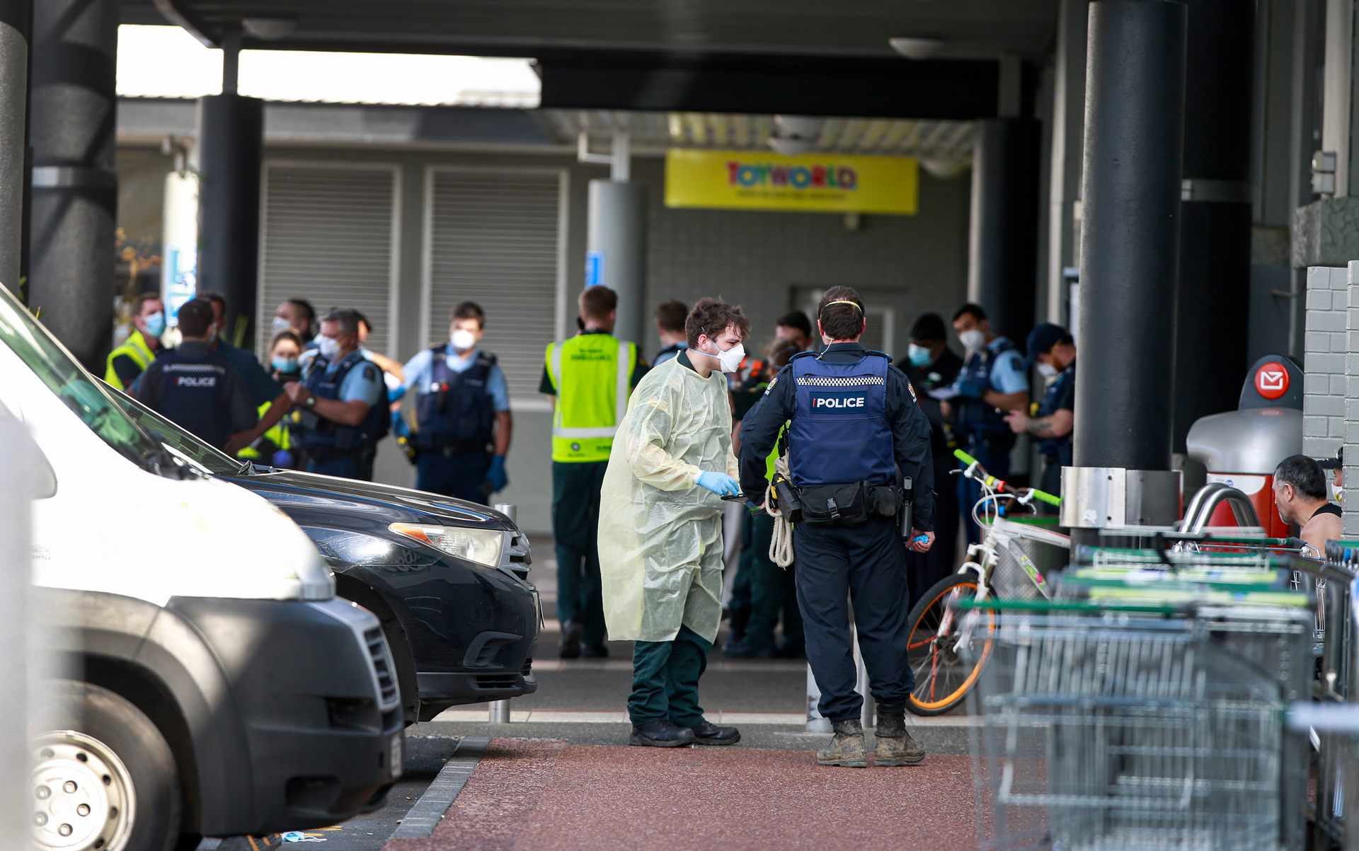 Emergency services at the scene of Friday's terrorist attack in West Auckland. Photo / Alex Burton