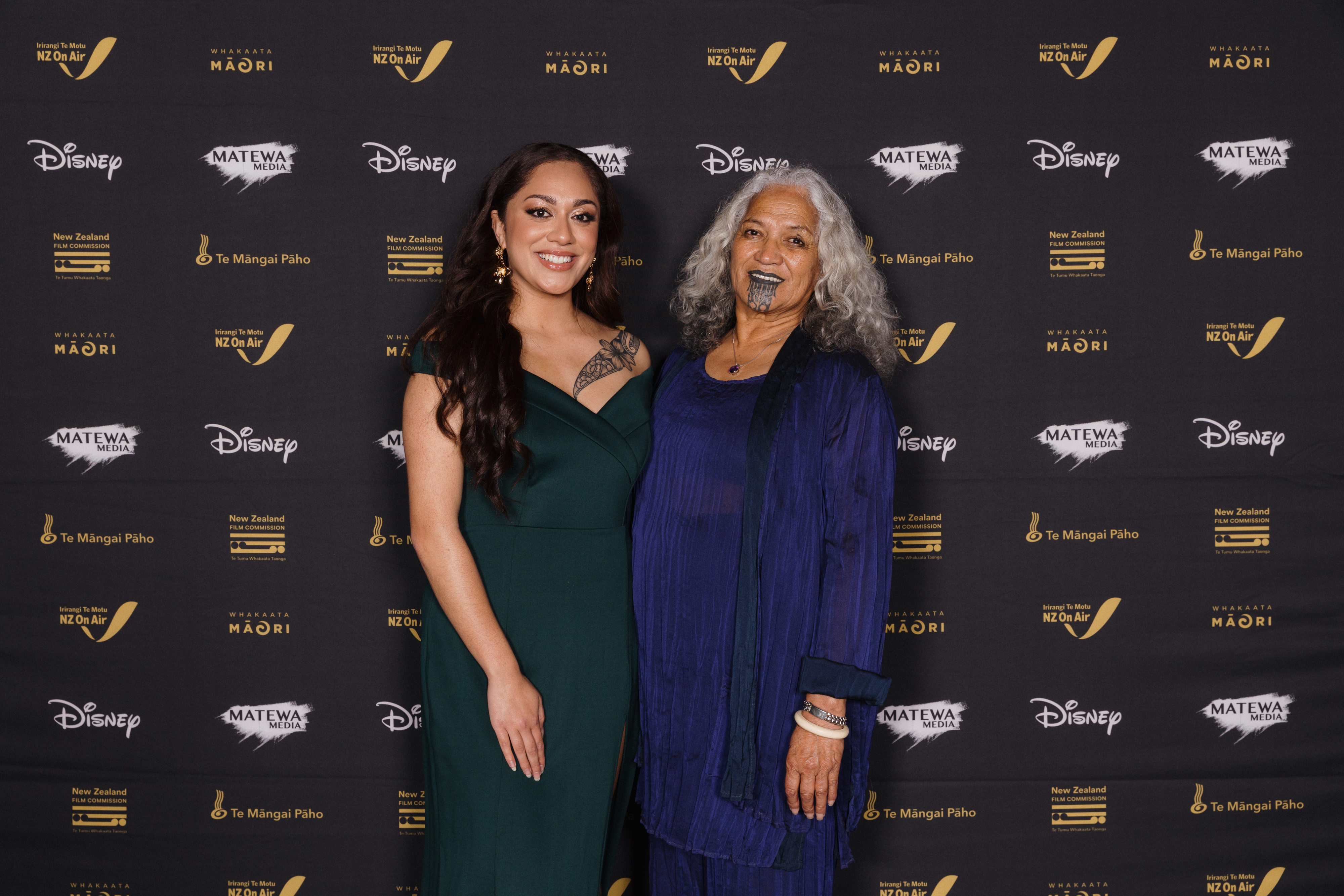 Te Waimarie Ngatai-Callaghan (Mirabel) and Hinetu Dell (Abuela Alma) at the screening for Encanto Reo Māori in Auckland. 