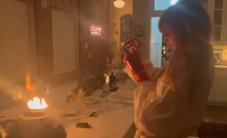 'Now we know how to use a fire extinguisher,' wrote Gracie Abrams on Instagram, posting a video of Taylor Swift putting out a fire in her kitchen. Photo / @gracieabrams