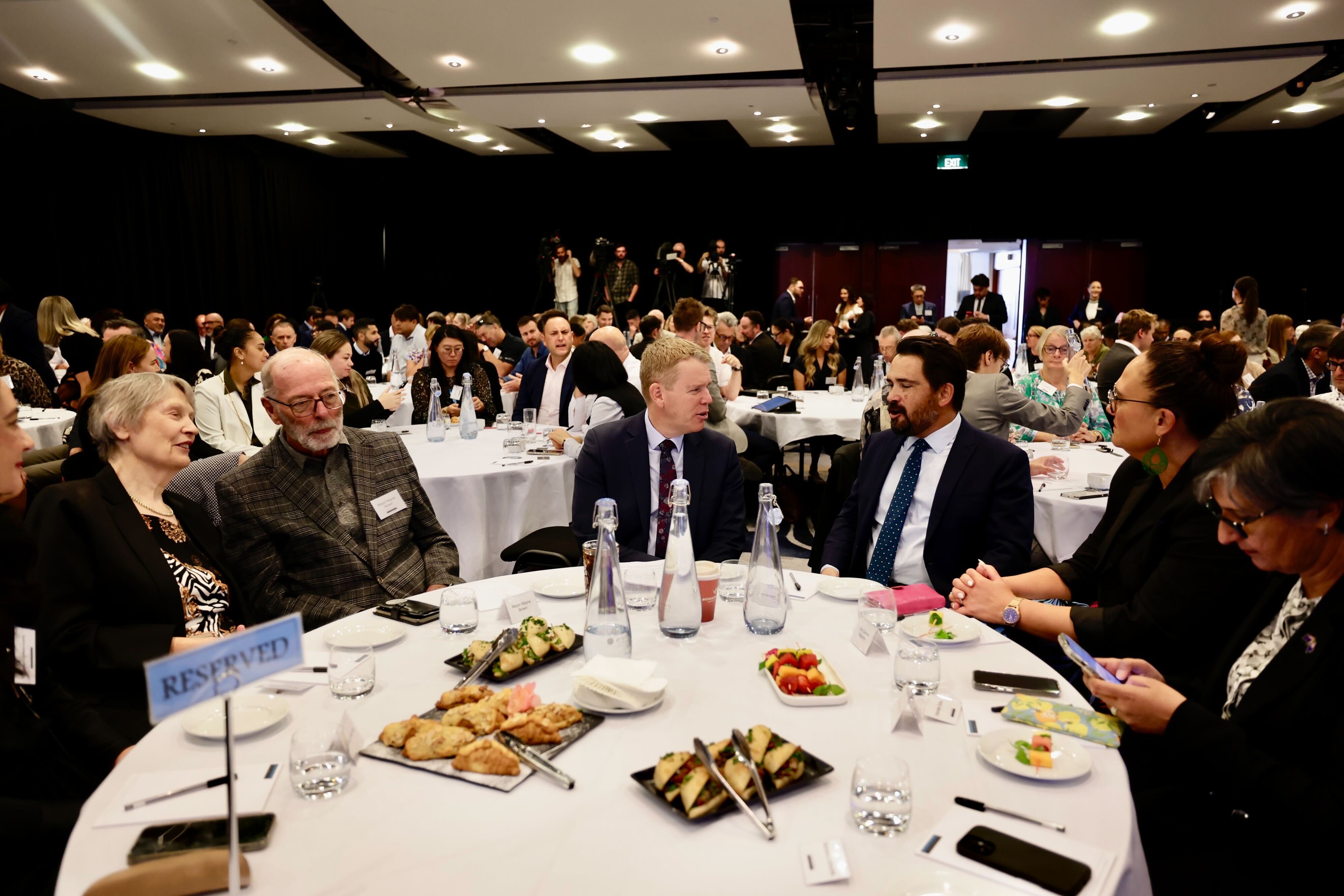 Labour leader Chris Hipkins with Simon Bridges, Wayne Brown and Helen Clark at this State of the Nation speech in Auckland. Photo / Dean Purcell