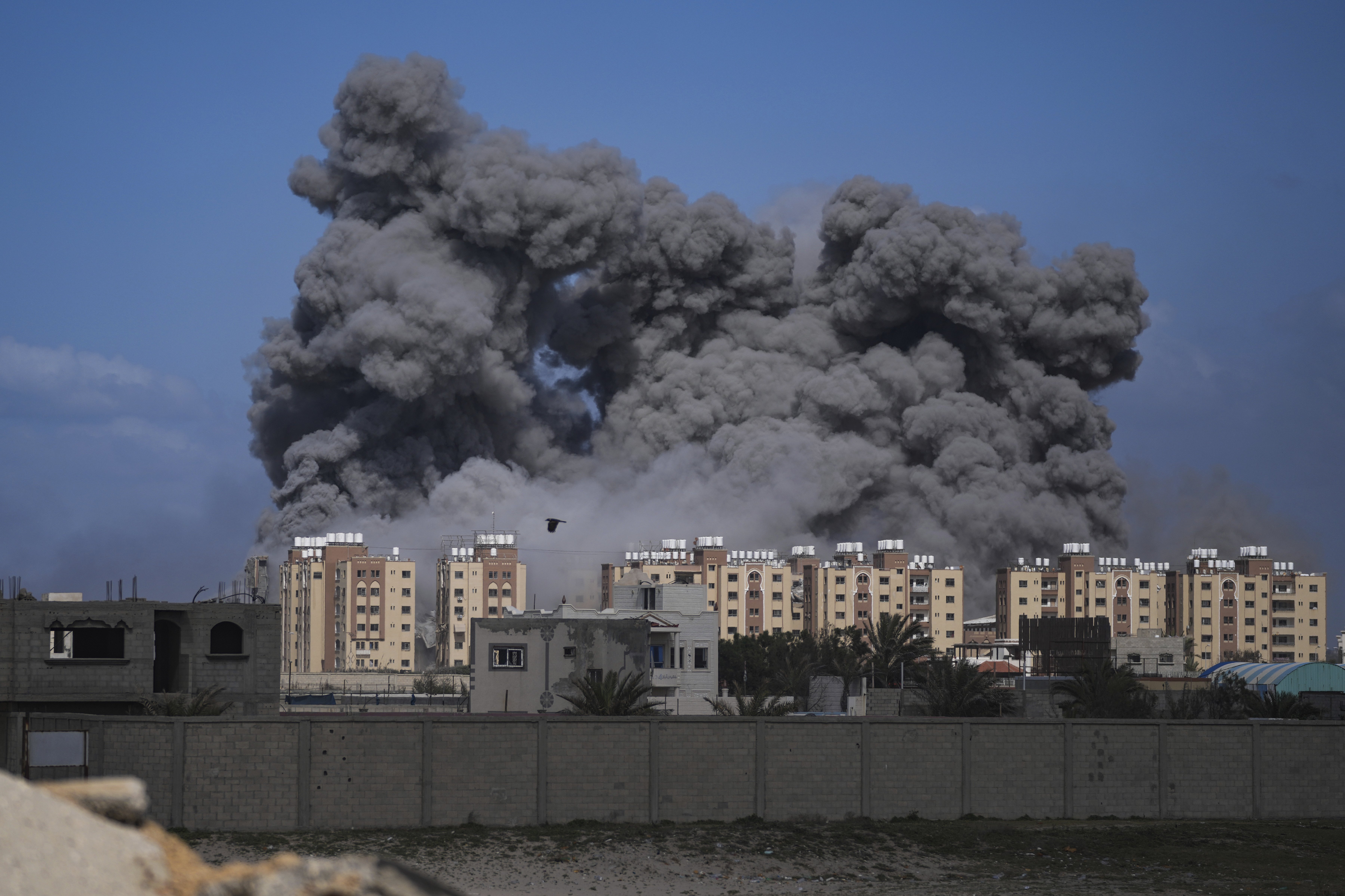 Smoke rises following an Israeli airstrike in the central Gaza Strip in March this year. Photo / AP