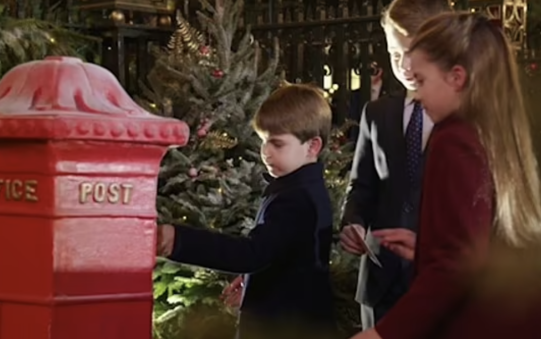 The Wales children posted their letters to Santa at the Christmas carol service. Photo / ITV