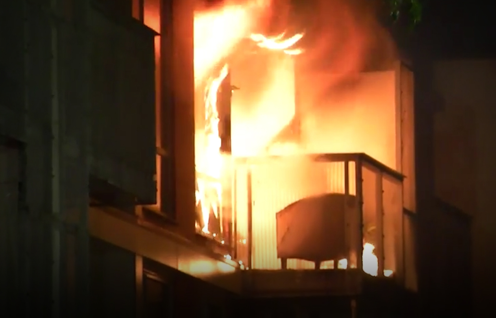 Firefighters saved residents of a Kāinga Ora apartment block from a balcony as flames continued to tear through the building early this morning. Photo / 1News
