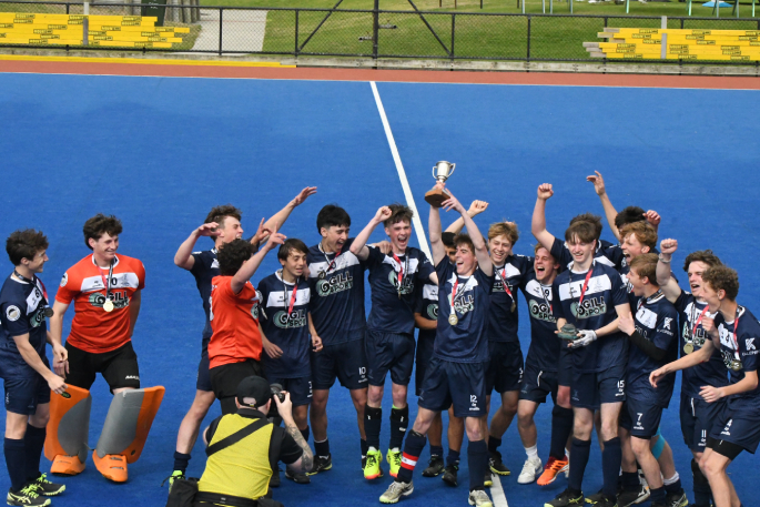 Tauranga Boys' College First XI celebrate after winning the final of schoolboy hockey's Rankin Cup. Photo / Sally Valois