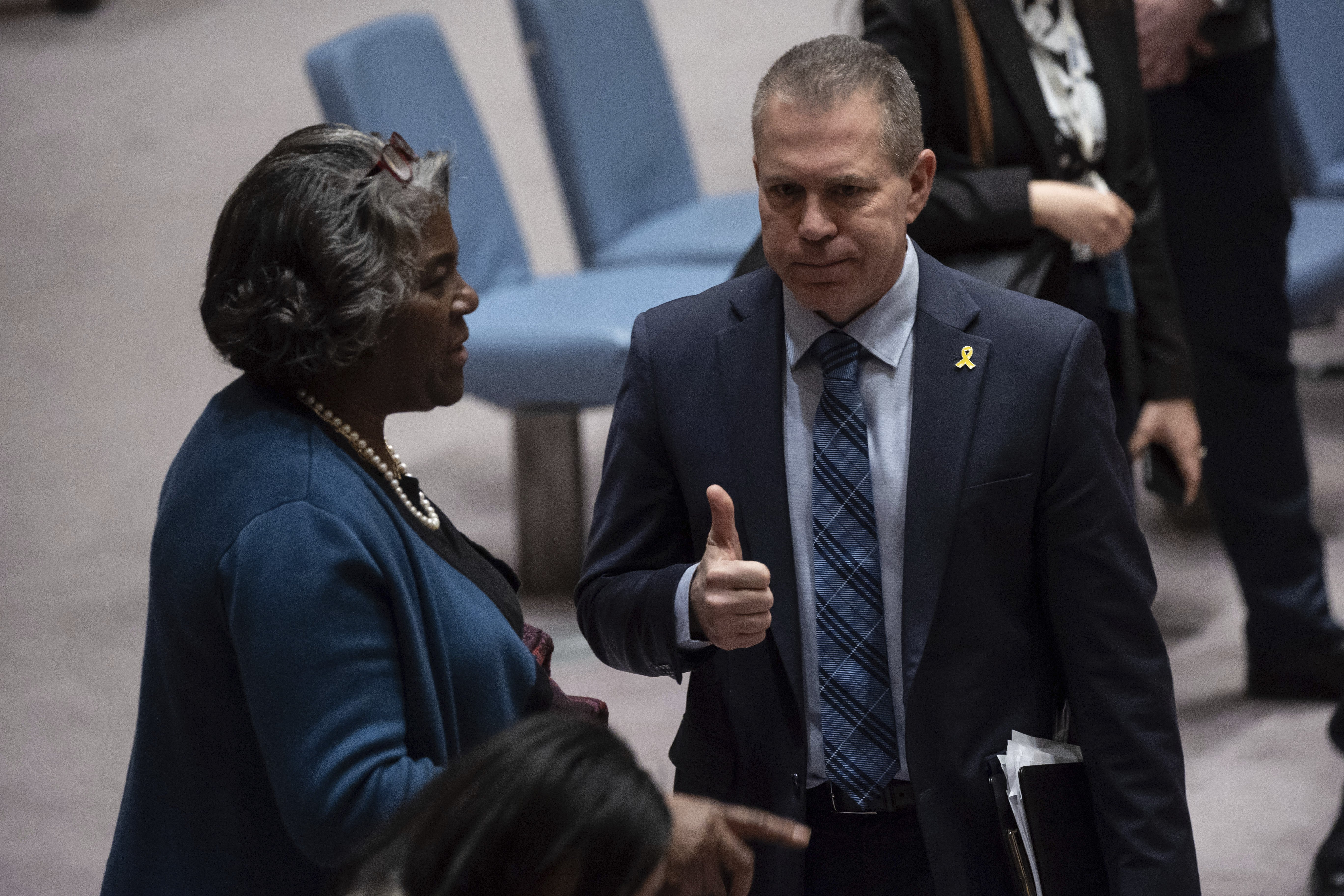 Gilad Erdan, Permanent Representative of Israel to the United Nations, right, and Linda Thomas-Greenfield, United States Ambassador and Representative to the United Nations, left, talk after a Security Council meeting at United Nations headquarters. Photo / AP