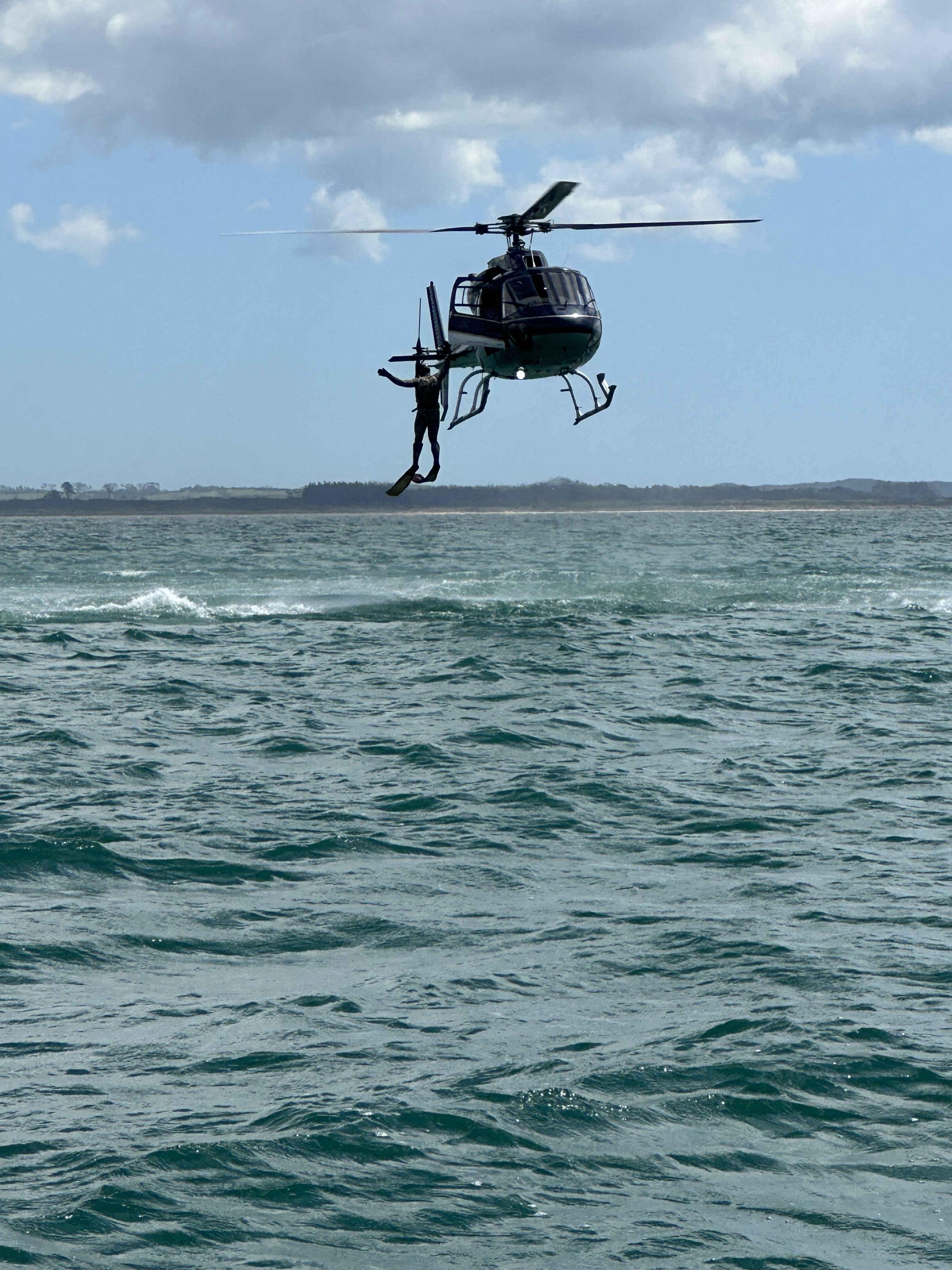 A police diver prepares to enter the waters of Doubtless Bay. Photo / Supplied
