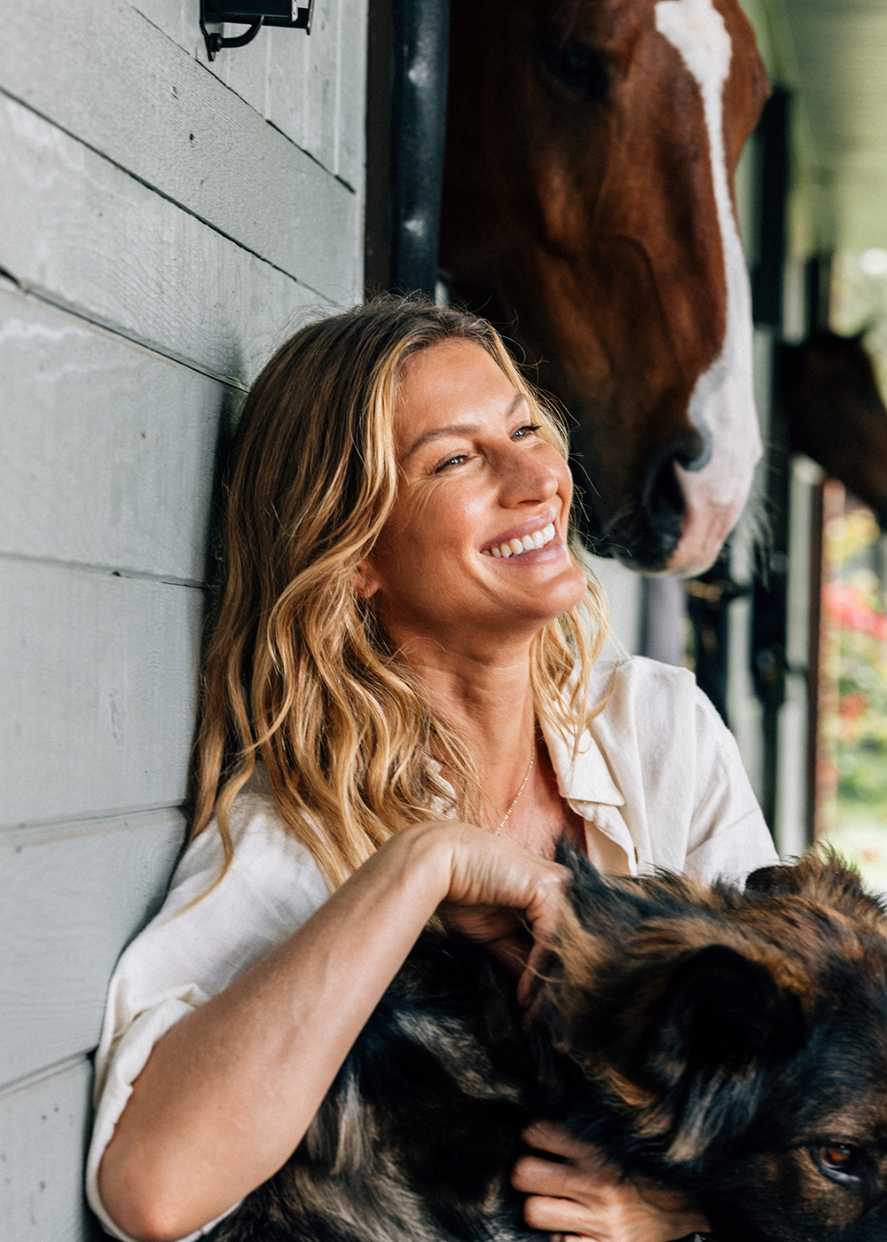 Gisele Bündchen with her dog Alfie and daughter’s horse Idem, at home in Southwest Ranches, Florida. Photo / Rose Marie Cromwell, The New York Times