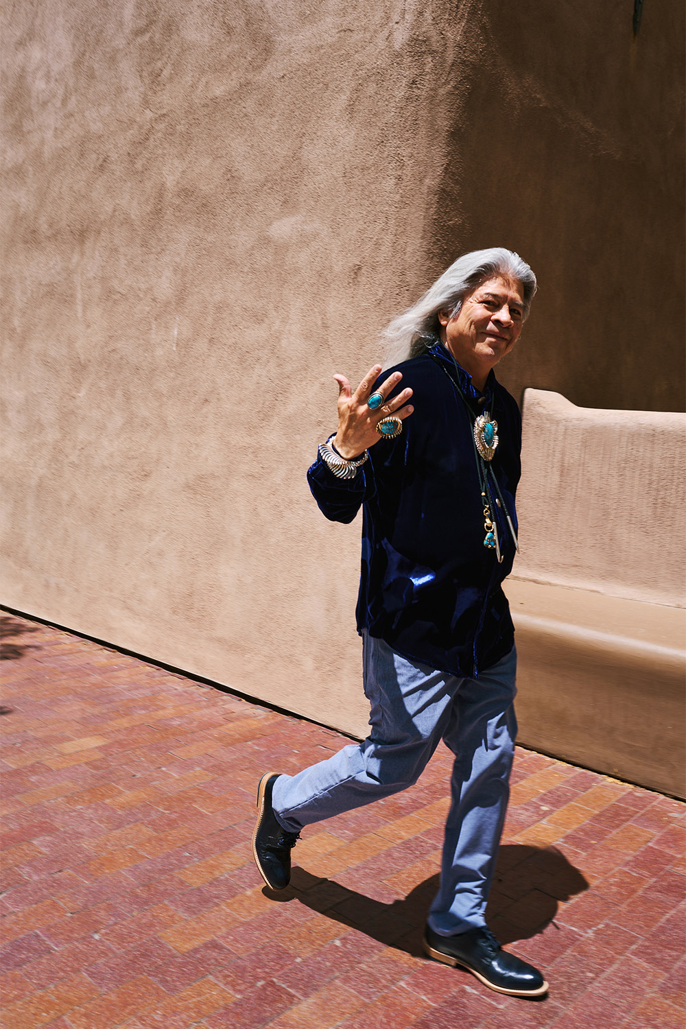 An attendee in blues and turquoise. Photo / Simbarashe Cha for The New York Times