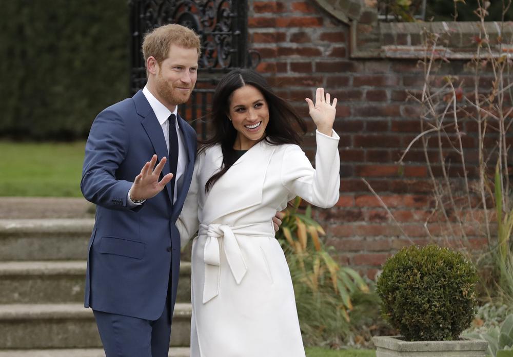 Britain's Prince Harry and his fiancee Meghan Markle pose for photographers during a photocall in the grounds of Kensington Palace in London, Nov. 27, 2017. Photo / File, AP
