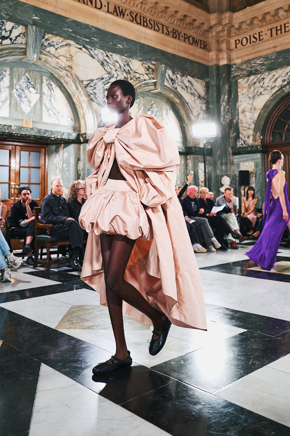 An ensemble on the Simone Rocha runway with the colour and fluffiness of frosting. Photo / Simbarashe Cha for The New York Times