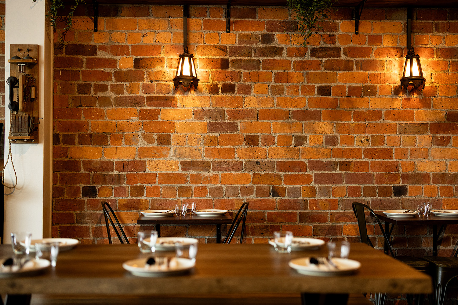 The brick-walled dining room at Rahi. Photo / Babiche Martens