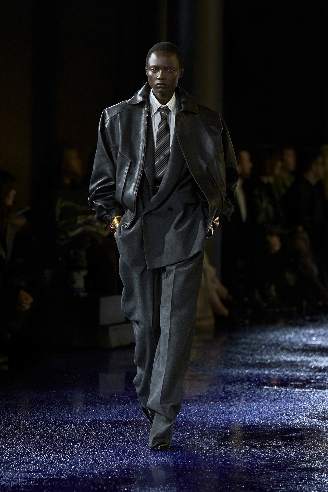 Blouson leather jackets were layered over impeccably tailored suits.