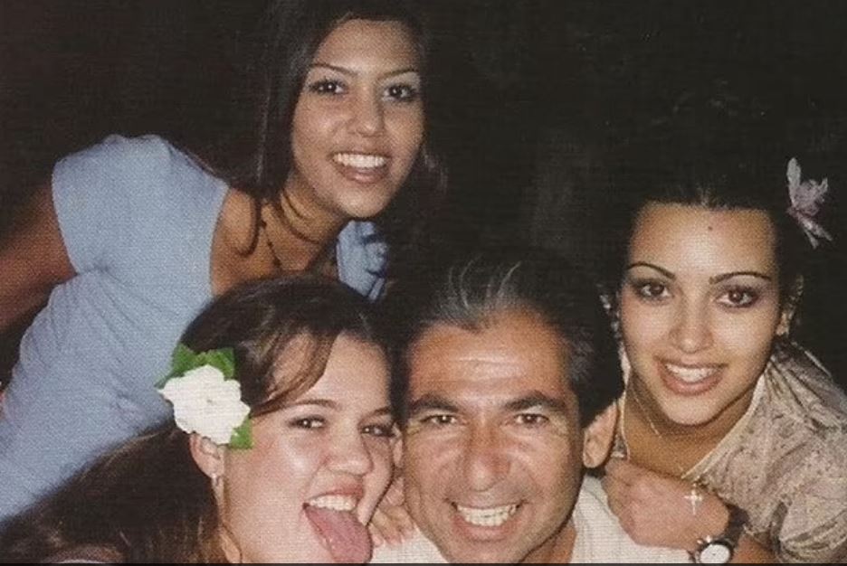 Kim Kardashian with her father, the late Robert Kardashian, and sisters Kourtney and Khloe. Photo / Instagram