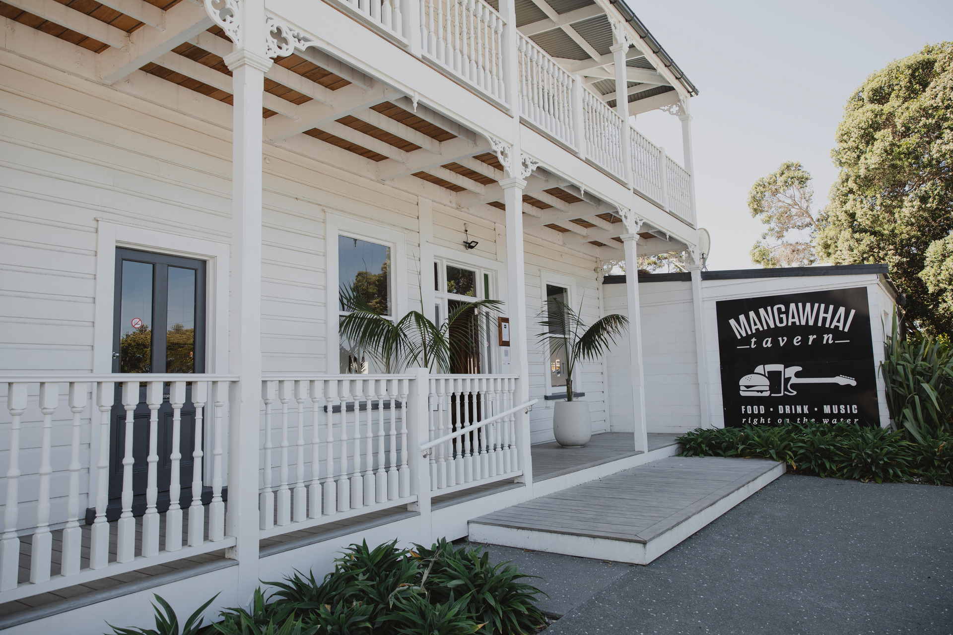 The Mangawhai Tavern is a historic hotel now infamous as a live music venue. Photo / Supplied