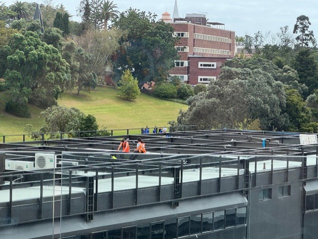 Work is underway on the station on the rooftop of the building on College Hill.