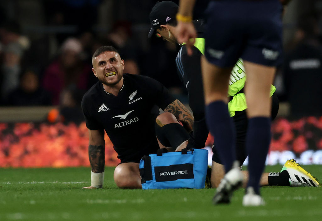 TJ Perenara reacts before going off injured against England. Photo / Getty