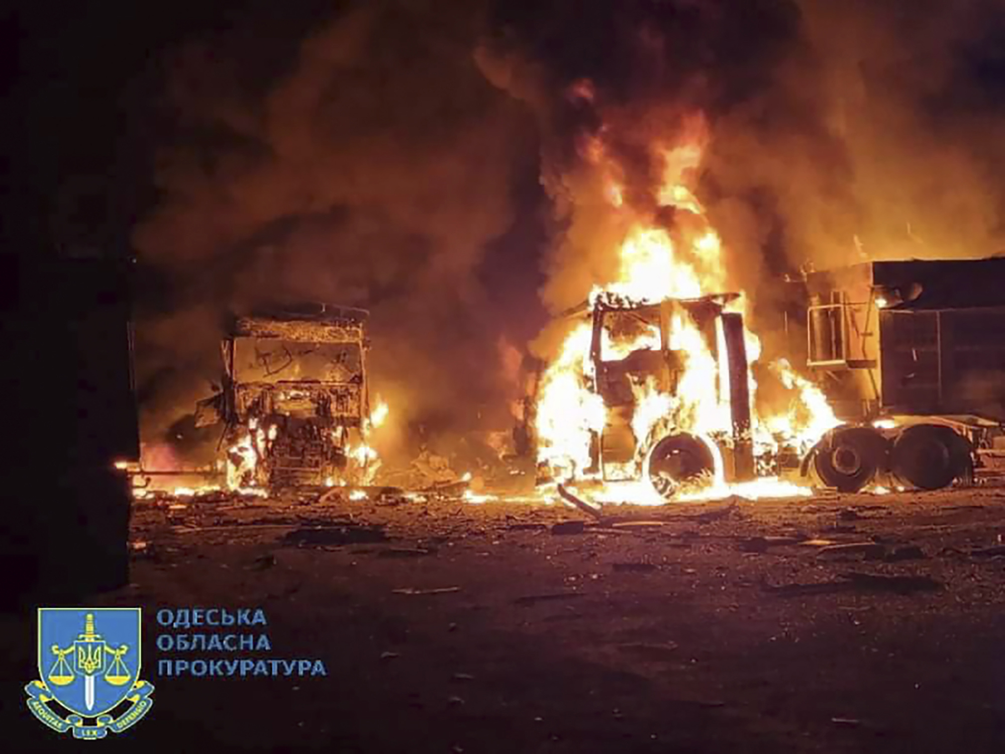 In this photo, provided by the Odesa Regional Prosecutor's Office, burning trucks are seen in Odesa, Ukraine. Photo / AP
