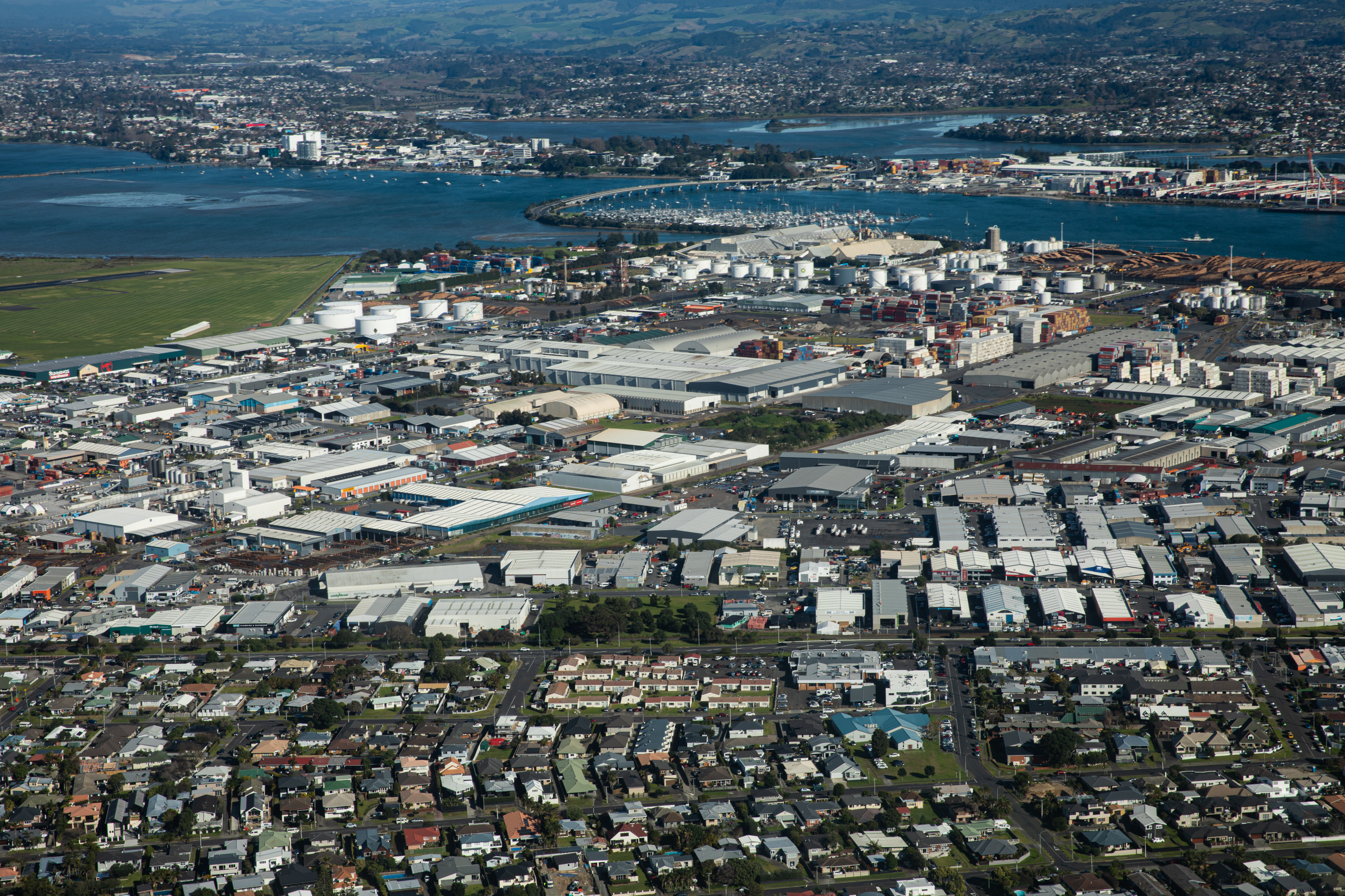 Mount Maunganui and Tauranga CBD as seen from above. Key Mount projects have been delayed due to budget constraints. Photo / Mead Norton