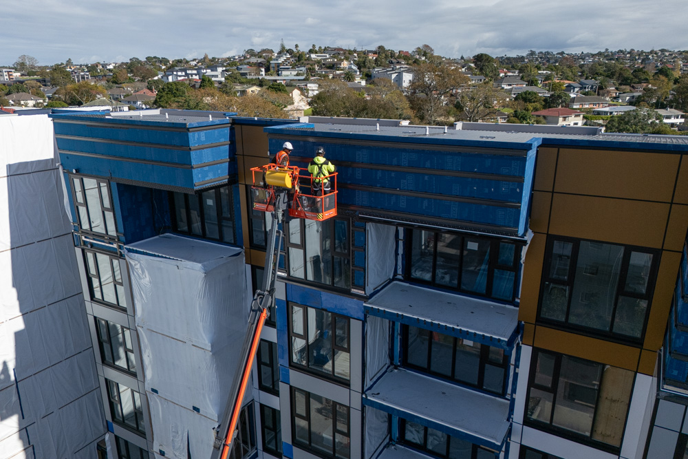 Cladding is more advanced on one building at Elevation than another. Photo / Jason Dorday