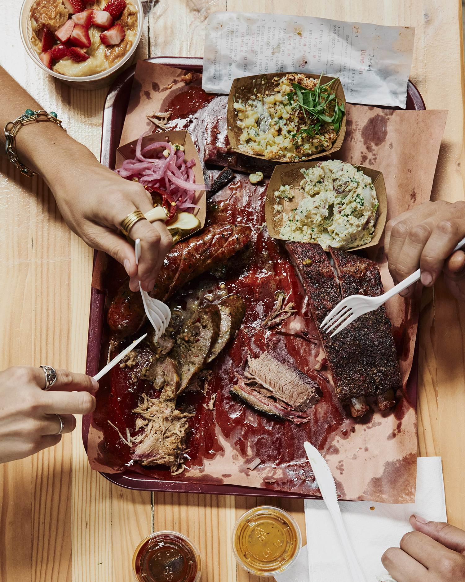 A tray of offerings at Moo’s Craft Barbecue, which Andrew and Michelle Mu–oz grew from home-hosted pop-ups into a full restaurant, in the Lincoln Heights neighbourhood of Los Angeles. Photo / Adam Amengual, The New York Times
 



