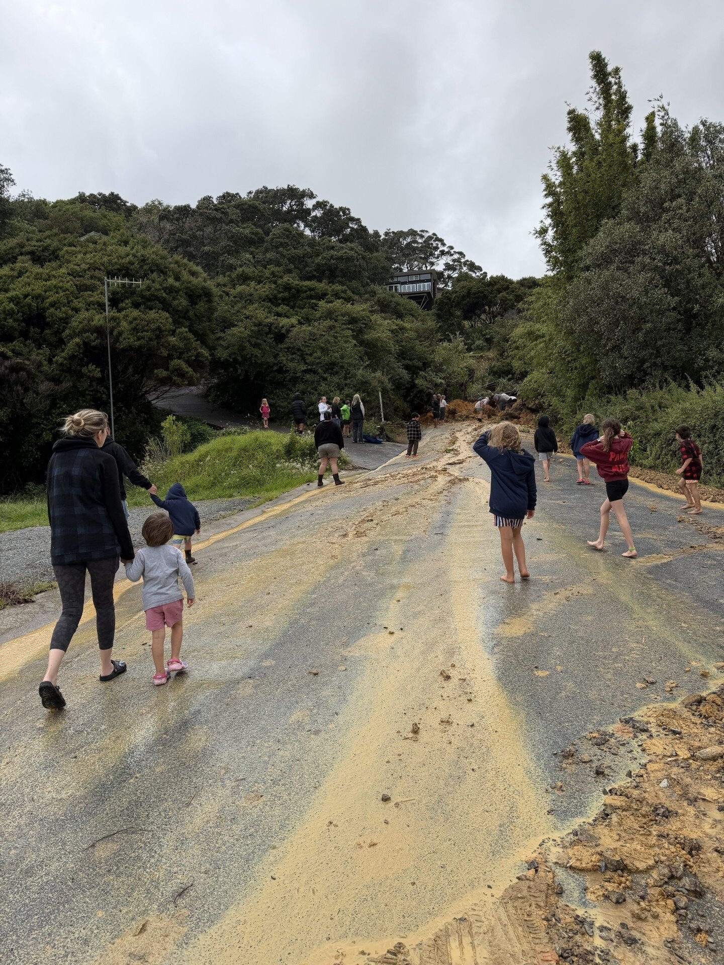 Their belongings saturated or swept away, the families wanted to get home but were trapped in the area by a landslip. Photo / Supplied