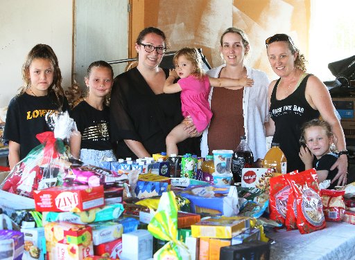 (From left): Sisters Taya and Ariya, founder Emily with her daughter, Nillah, friends Alys Koia, Sarah Beney and her daughter, Lucy. Photo / Tania Whyte