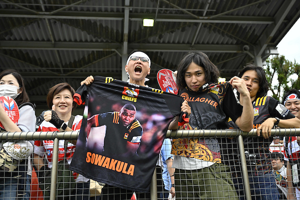 Japanese rugby fans invest in merchandise at a match in Tokyo featuring the All Blacks XV. Photo / Photosport
